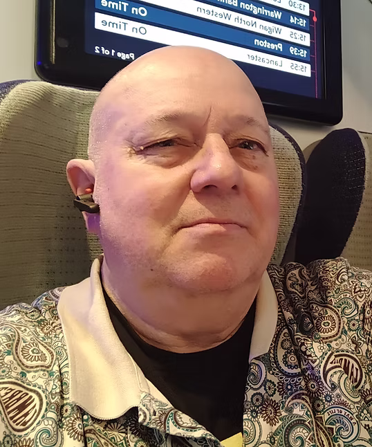 Neil on a train 12 1 24